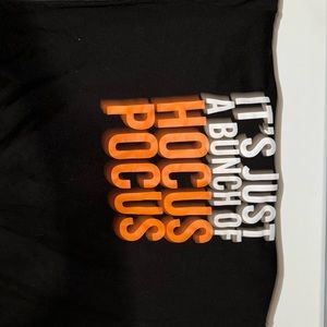 It’s just a bunch of hocus-pocus sweater that hangs off one side shoulder